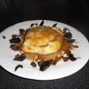 Duck Pithiviers (puff pastry stuffed with confit duck legs, sautéed duck breasts, mushrooms dired fruits with red wine and duck jus)