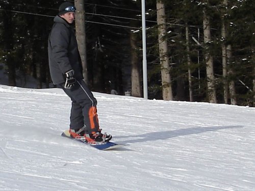 Milujem jazdu na snowborde....