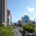 V pozadi kedysi jedna z najvyssich budov sveta - Tuntex Tower
