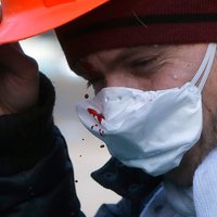 Moja obľúbená - Protest na Ukrajine 2014 dokumentačná fotografia  - Protestant zasiahnutý projektilom. 